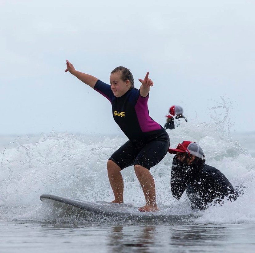 Gnome Surf adaptive surf therapy session on the beach